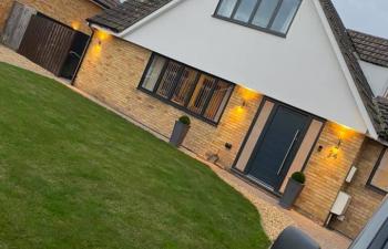 Exterior of home in Darlington with outdoor lighting installed by Demand Electrical Solutions 